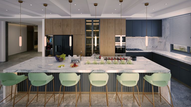 Luxurious kitchen design featuring marble countertops, pendant lighting, and sleek cabinetry.